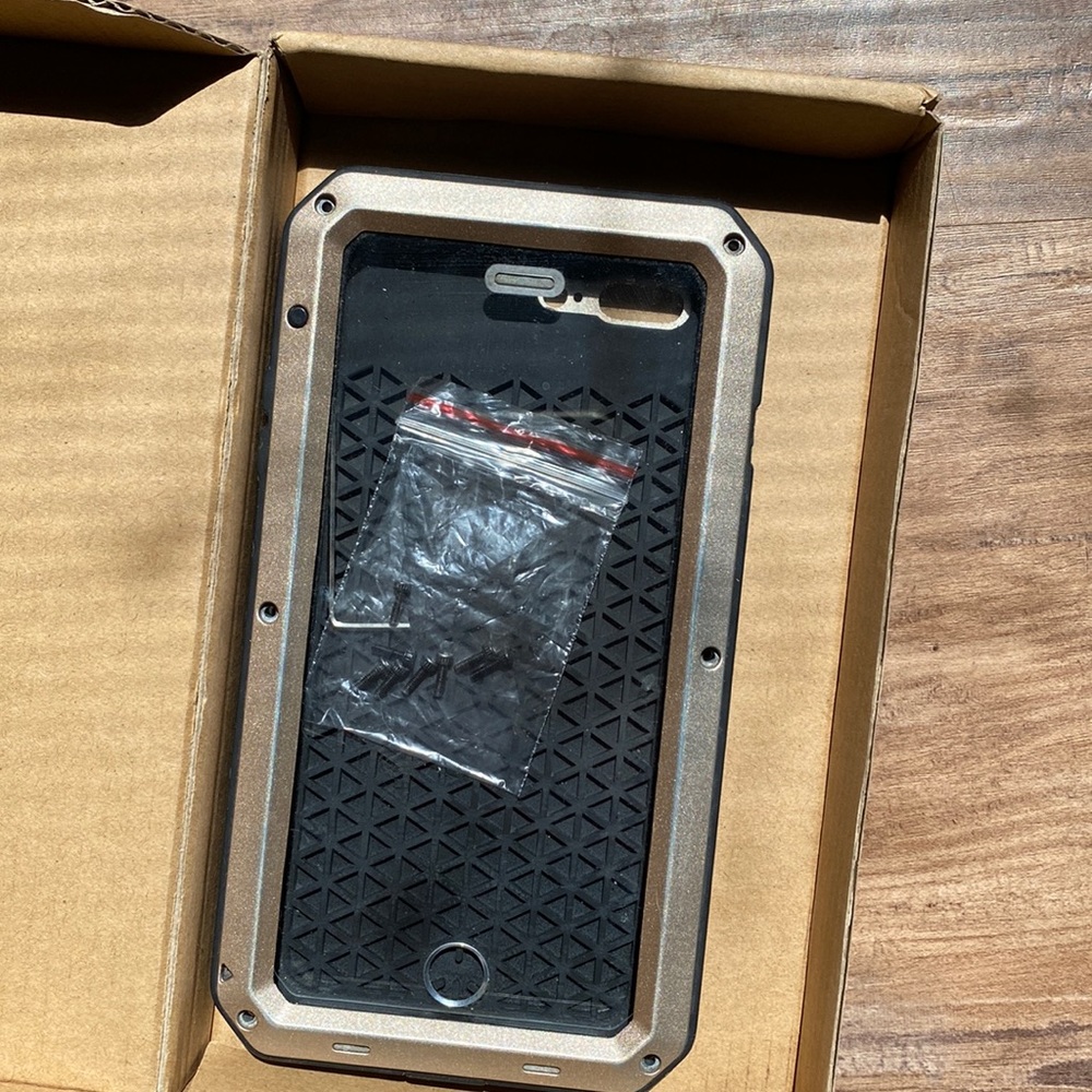 Heavy duty phone case with a small screwdriver for installation